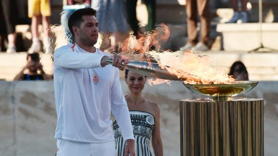 Greece hands Olympic flame to 2024 Paris Games host – MASHAHER