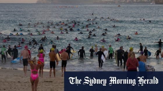 Hundreds of surfers paddle out for Bondi Beach tribute – MASHAHER