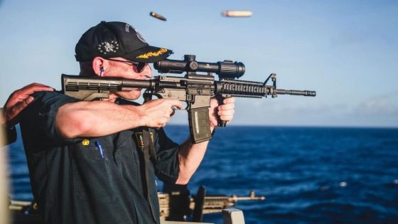 US Navy mocked for image of captain firing gun with back-to-front scope – MASHAHER