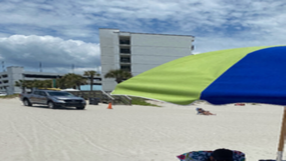 Pic captures beachgoer minutes before she was run over by Horry police truck. Woman named – MASHAHER