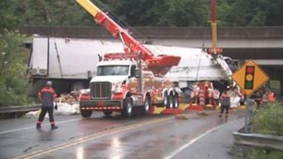 Semi-truck crashes into Parkway North barrier, rolls over onto road below, police say – MASHAHER