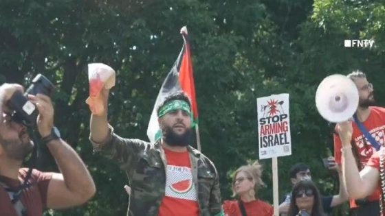 Anti-Israel agitator in Hamas headband holds up bloodied Biden face mask steps from White House – MASHAHER