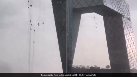 Horrifying Video Shows Window Cleaners Dangling From Beijing Tower During Storm – MASHAHER