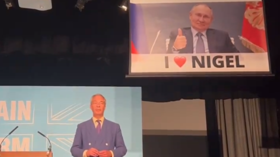 Nigel Farage speech interrupted by banner showing smirking Vladimir Putin | Politics News – MASHAHER