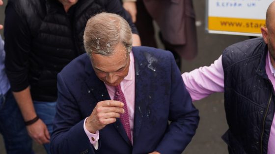 Woman, 25, charged with assault after milkshake thrown at Nigel Farage | Politics News – MASHAHER