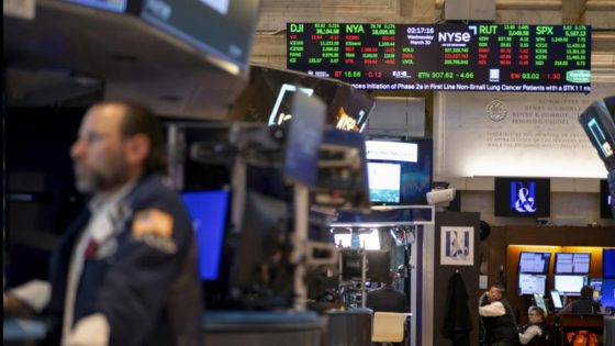 Wall St mixed as inflation data lifts small-cap stocks – MASHAHER