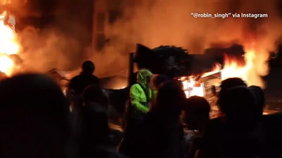 Rioters torch bus, flip police car in UK city – MASHAHER