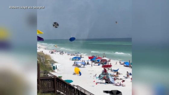 WATCH: Beach umbrellas go flying in the wind at Florida beach – MASHAHER