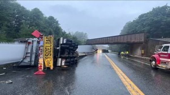 Tractor-trailer hauling windmill blade overturns after striking bridge on New England highway – MASHAHER