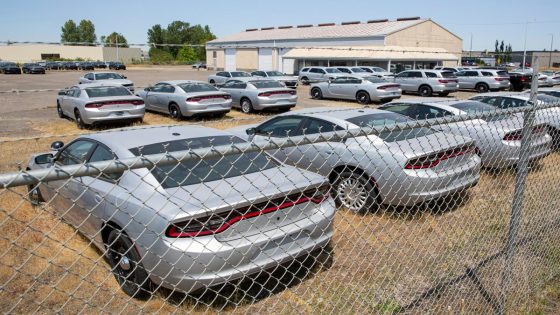 A fenced lot in Salem has dozens of silver Chargers and Durangos. Why is that? – MASHAHER