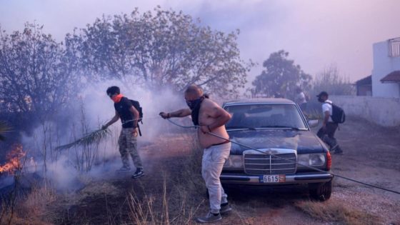 Wildfire fanned by gales menaces Athens suburbs – MASHAHER