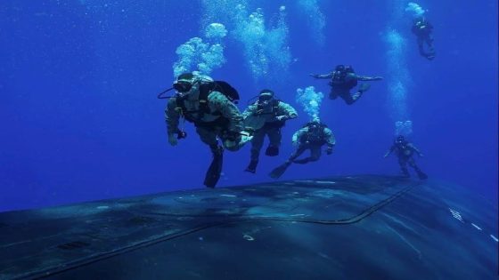 Underwater photos captured reconnaissance Marines diving next to a US missile submarine out in the open ocean – MASHAHER