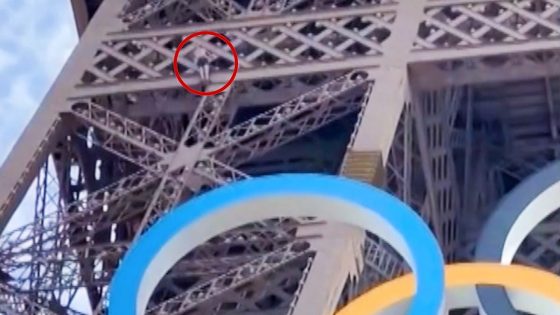 Man seen climbing Eiffel Tower above Olympic rings – MASHAHER