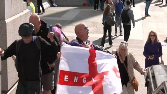 Stand Up To Racism protestor grabs St George’s flag at Trafalgar Square demonstration – MASHAHER