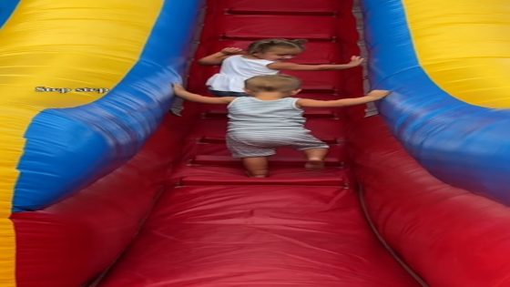 WATCH: Sister cheers on little brother, shows him how to go down slide – MASHAHER